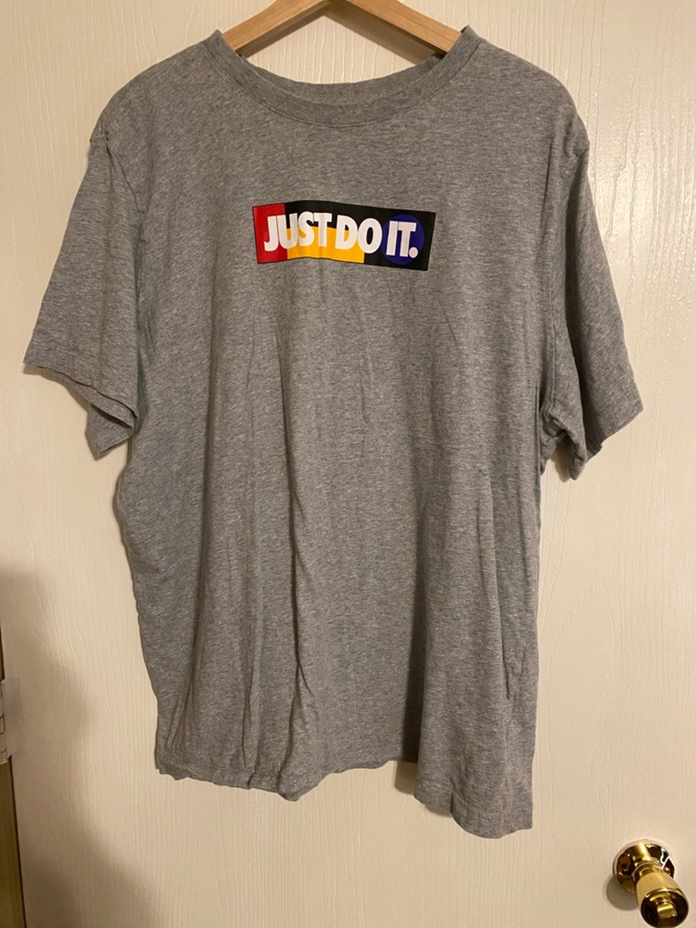 Nike Grey Tee with Multicolor "JUST DO IT." Logo